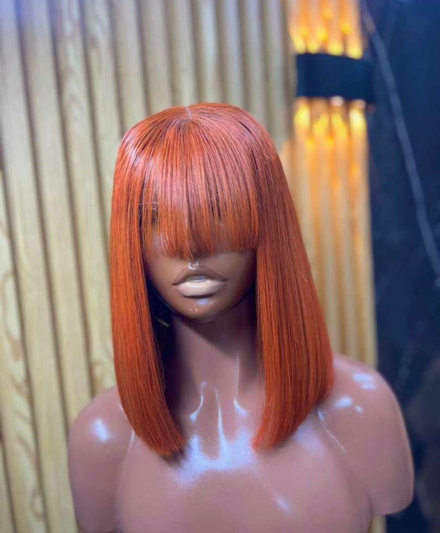 Coupe courte vietnamienne Orange avec frange - Long 10- Densité 210%