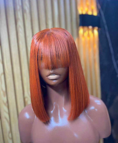 Coupe courte vietnamienne Orange avec frange - Long 10- Densité 210%