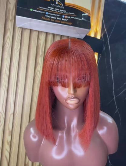 Coupe courte vietnamienne Orange avec frange - Long 10- Densité 210%